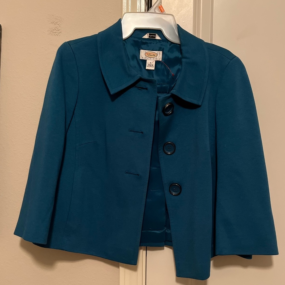 Really cute blue jacket, never worn , great condition